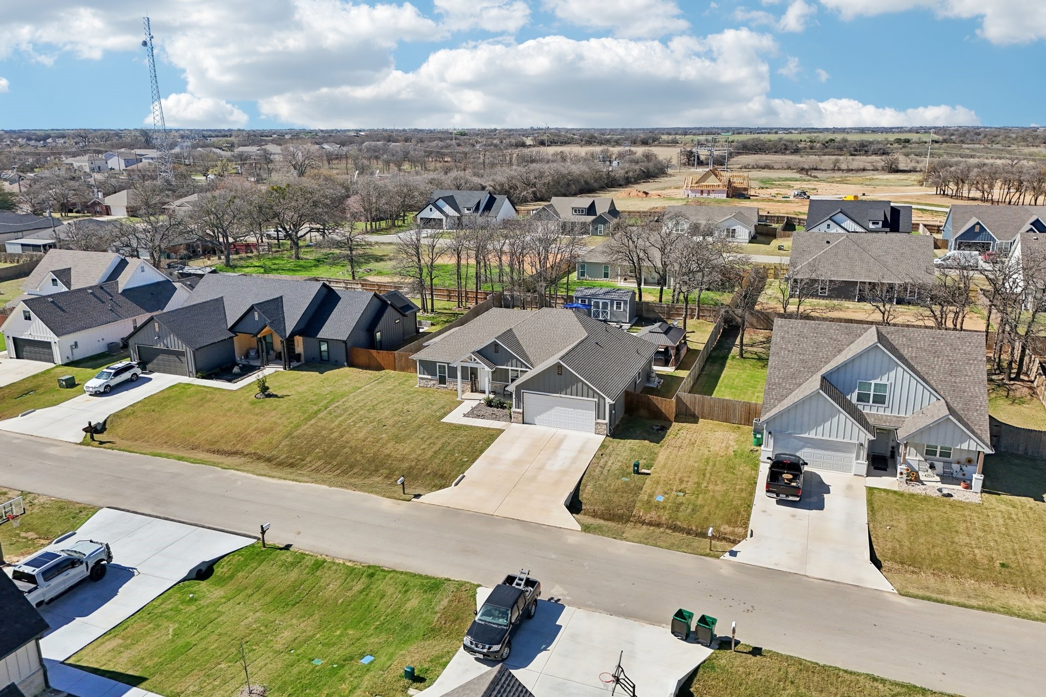 2032 Rattler Way Tolar, TX 76476 - Photo 46 of 49 an aerial view of residential houses with outdoor space