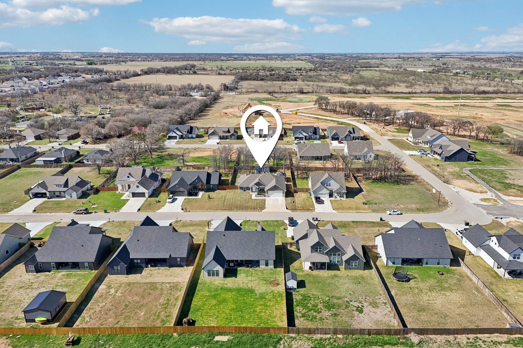 2032 Rattler Way Tolar, TX 76476 - Photo 49 of 49 an aerial view of residential houses with outdoor space