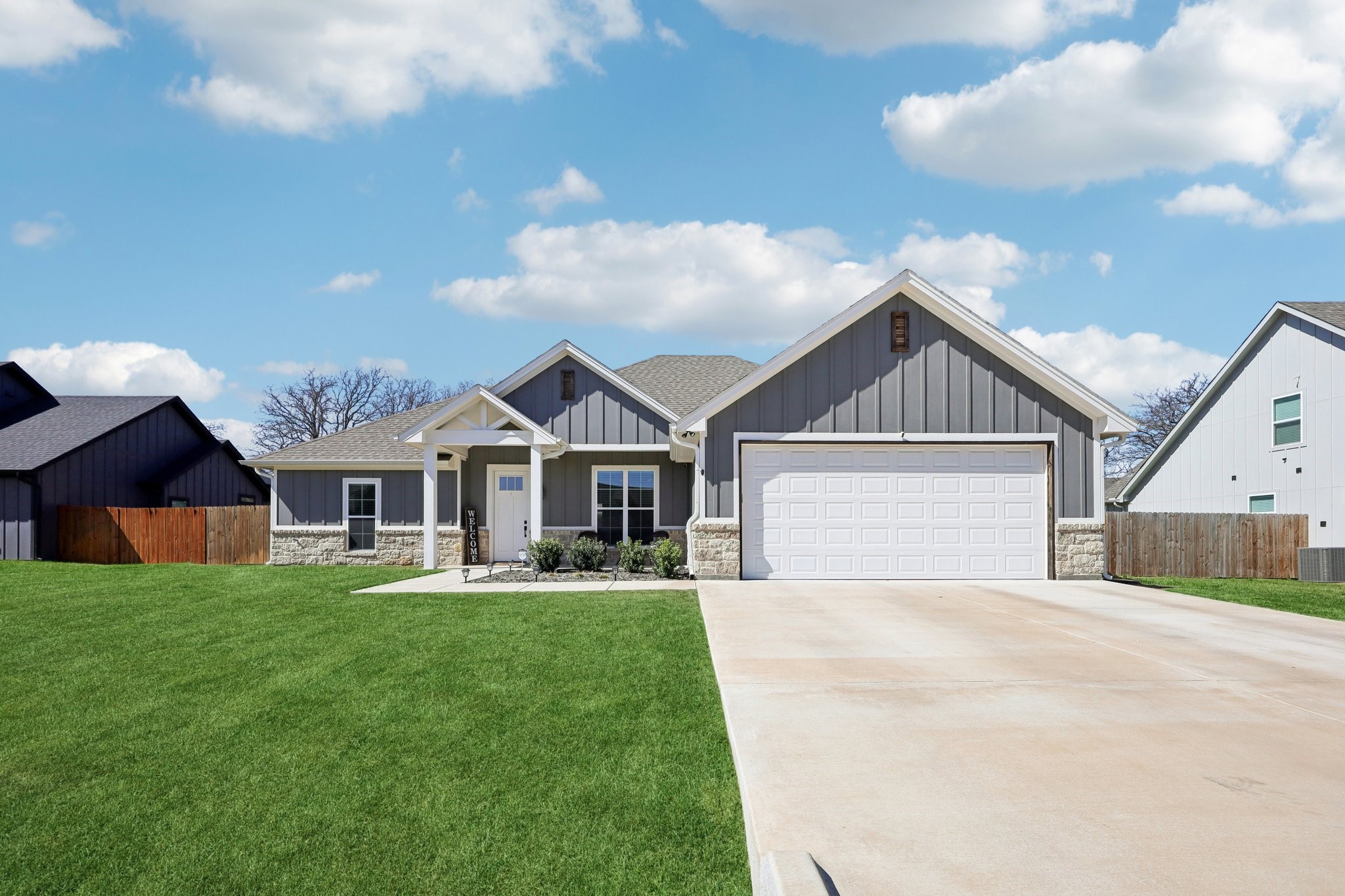 2032 Rattler Way Tolar, TX 76476 - Photo 7 of 49 a front view of house with yard and green space