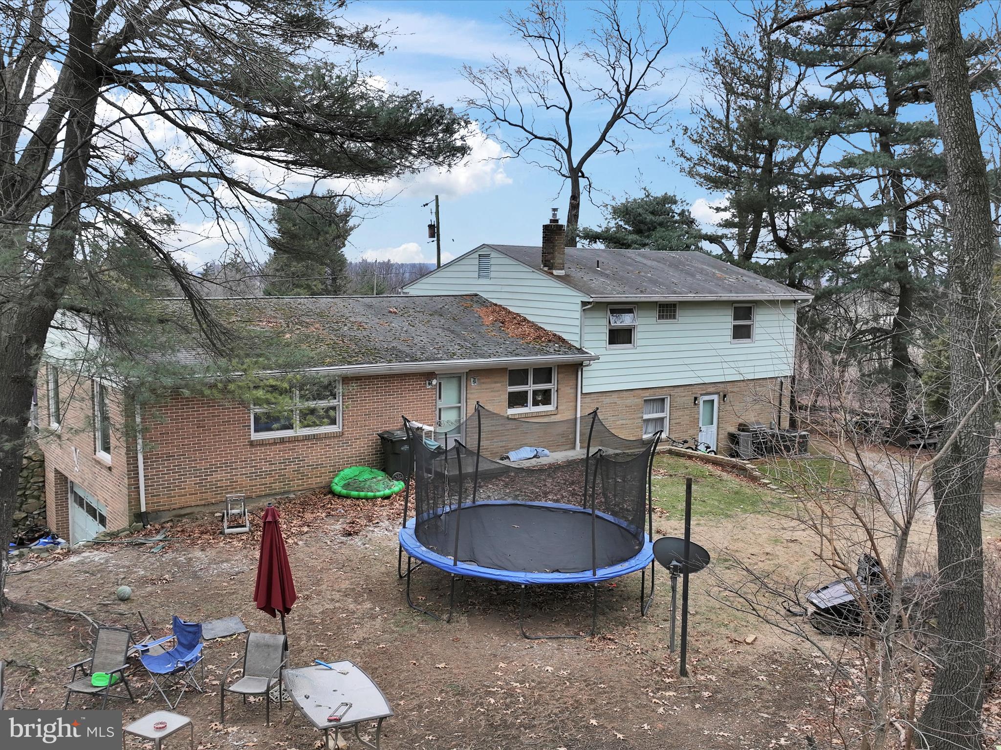 1181 Knights View Road Wrightsville, PA 17368 - Photo 36 of 40 a view of a house with a yard fire pit and outdoor seating