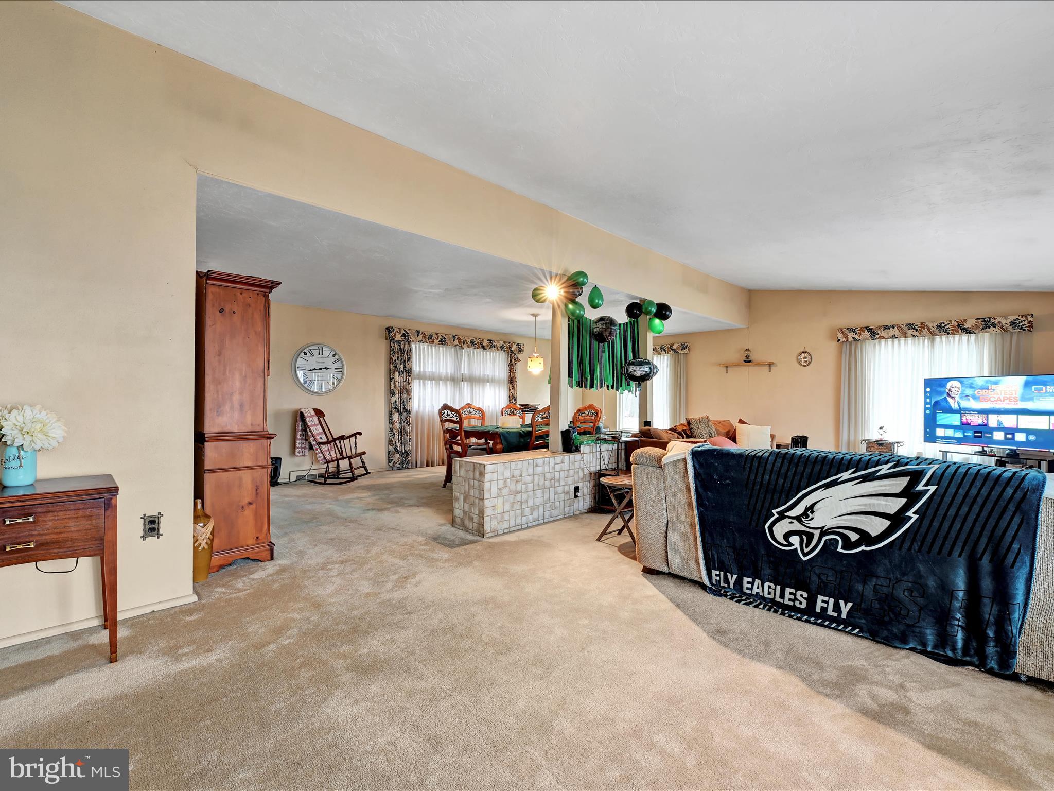 1181 Knights View Road Wrightsville, PA 17368 - Photo 8 of 40 a living room with furniture and a flat screen tv