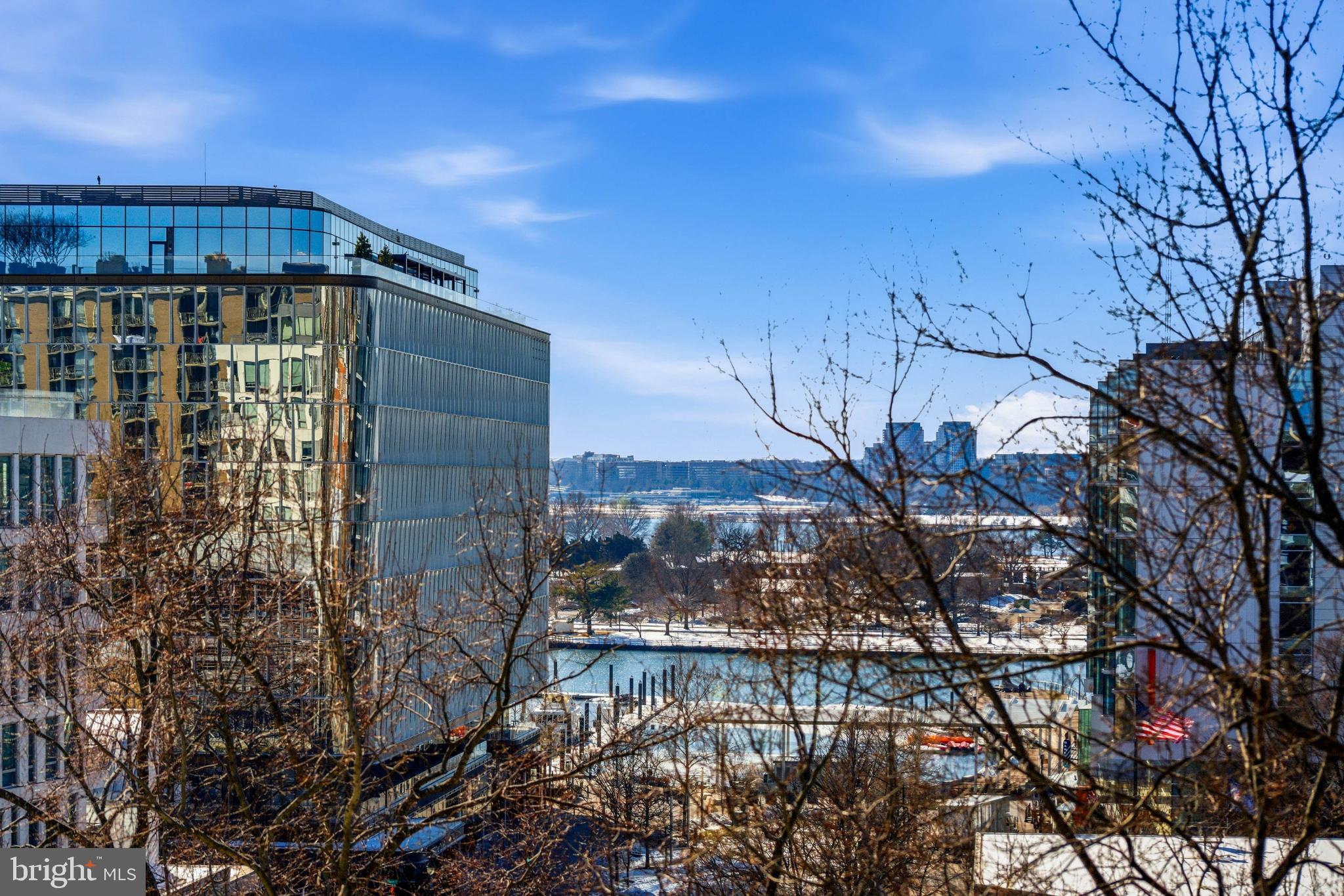 700 7th Street Southwest, Unit 826 Washington, DC 20024 - Photo 14 of 50 Urban skyline meets serene waterfront view.