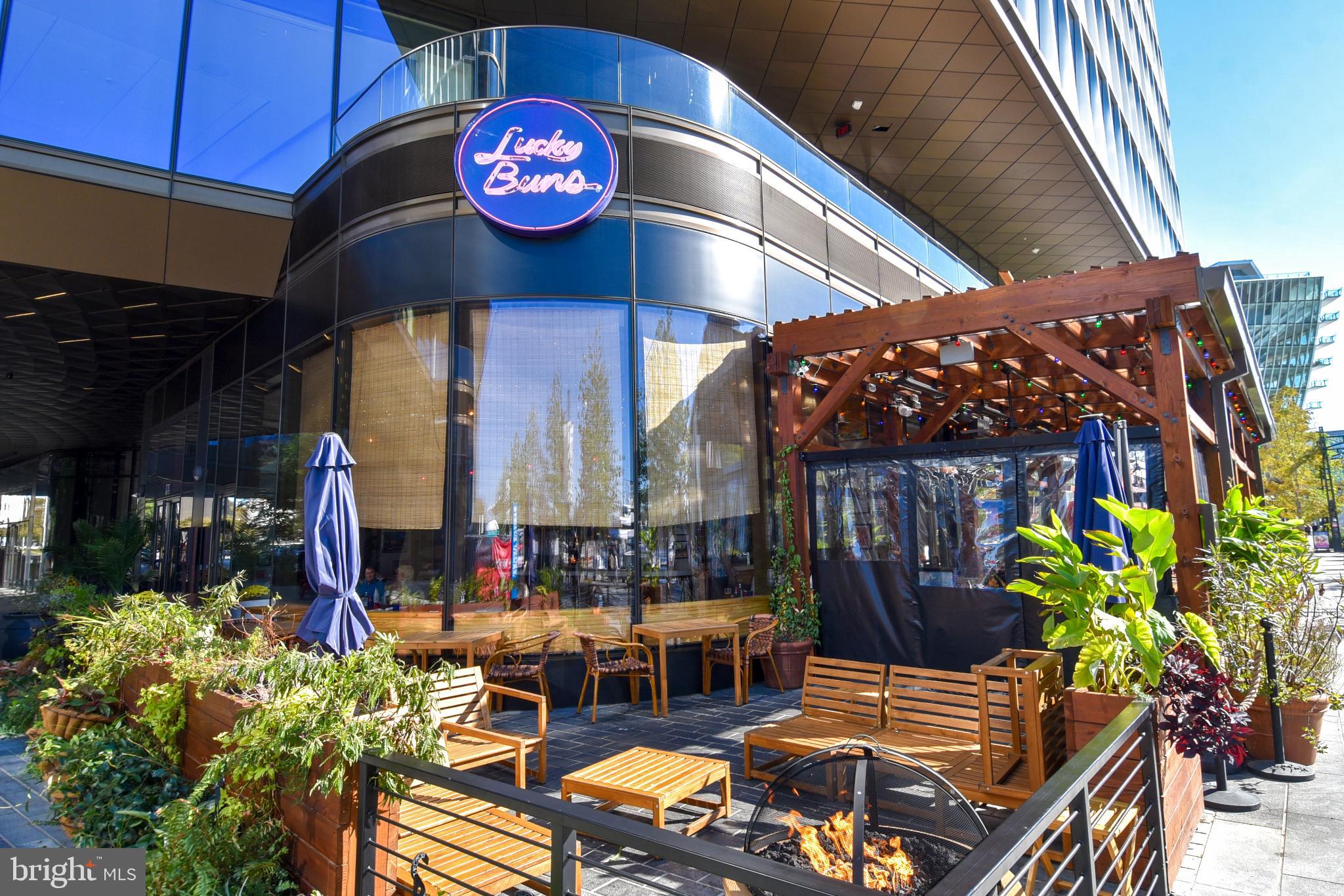 700 7th Street Southwest, Unit 826 Washington, DC 20024 - Photo 35 of 49 a view of a chairs and tables in patio