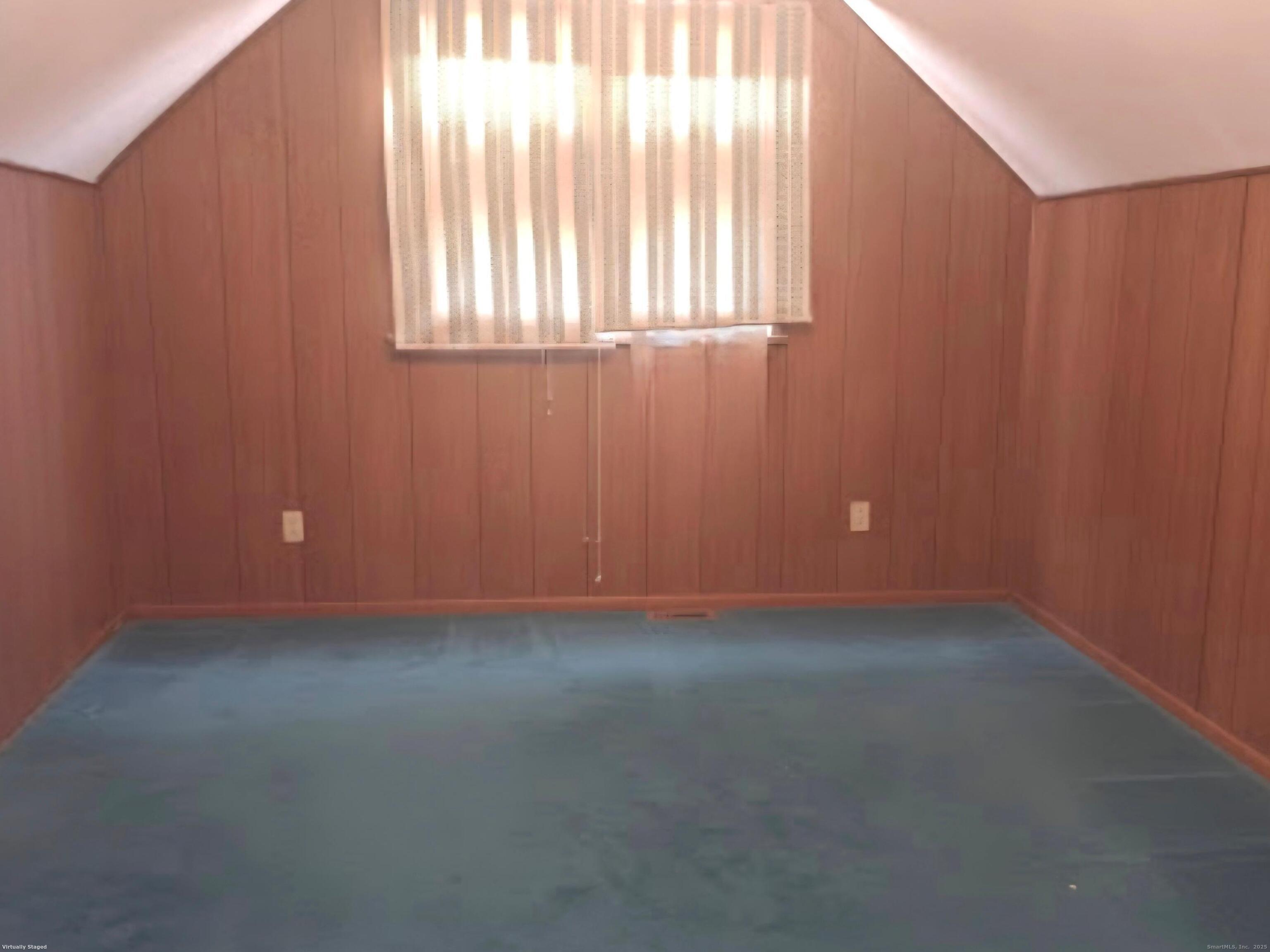 114 Oxford Street Bridgeport, CT 06606 - Photo 8 of 8 an empty room with windows