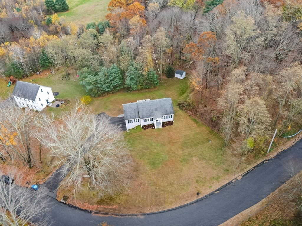 11 Shea Road West Brookfield, MA 01585 - Photo 11 of 42 an aerial view of a house with a yard and lake view