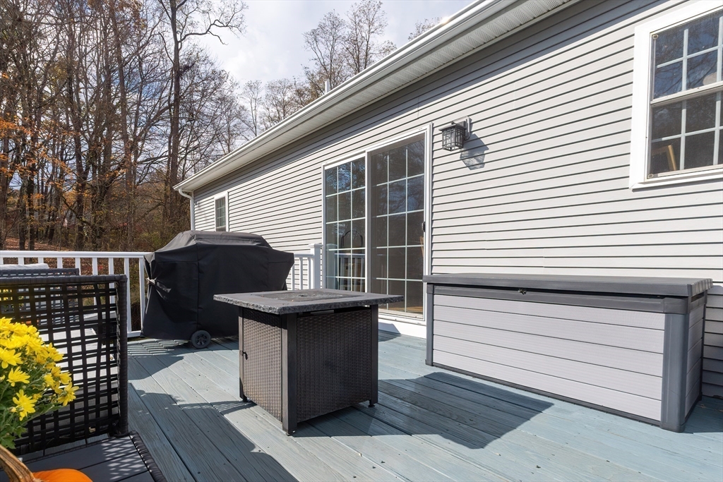 11 Shea Road West Brookfield, MA 01585 - Photo 14 of 42 a view of a roof deck with couches and wooden floor