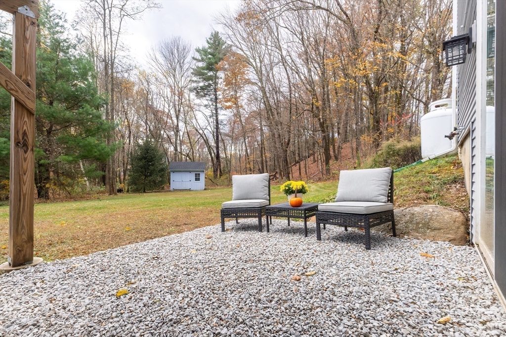 11 Shea Road West Brookfield, MA 01585 - Photo 15 of 42 a view of a bench in a backyard