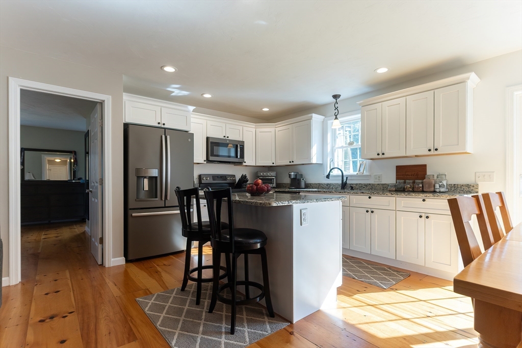 11 Shea Road West Brookfield, MA 01585 - Photo 17 of 42 a kitchen with stainless steel appliances granite countertop a refrigerator and a stove top oven