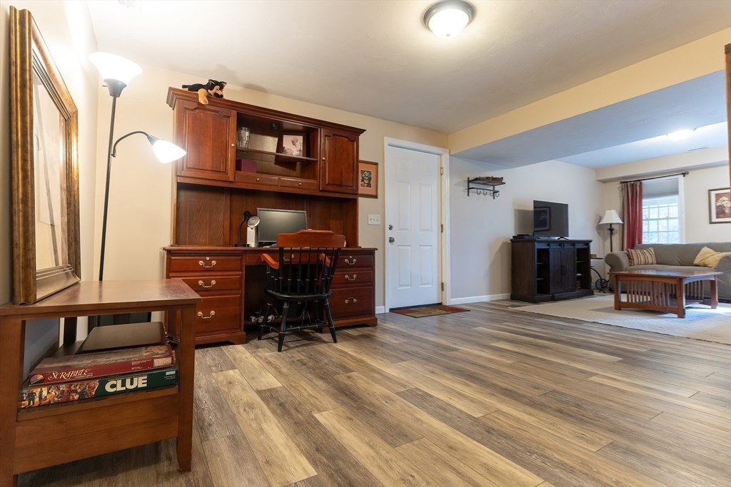 11 Shea Road West Brookfield, MA 01585 - Photo 38 of 42 a living room with furniture and a flat screen tv