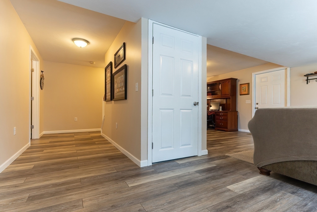 11 Shea Road West Brookfield, MA 01585 - Photo 39 of 42 a view of livingroom with hardwood floor and kitchen