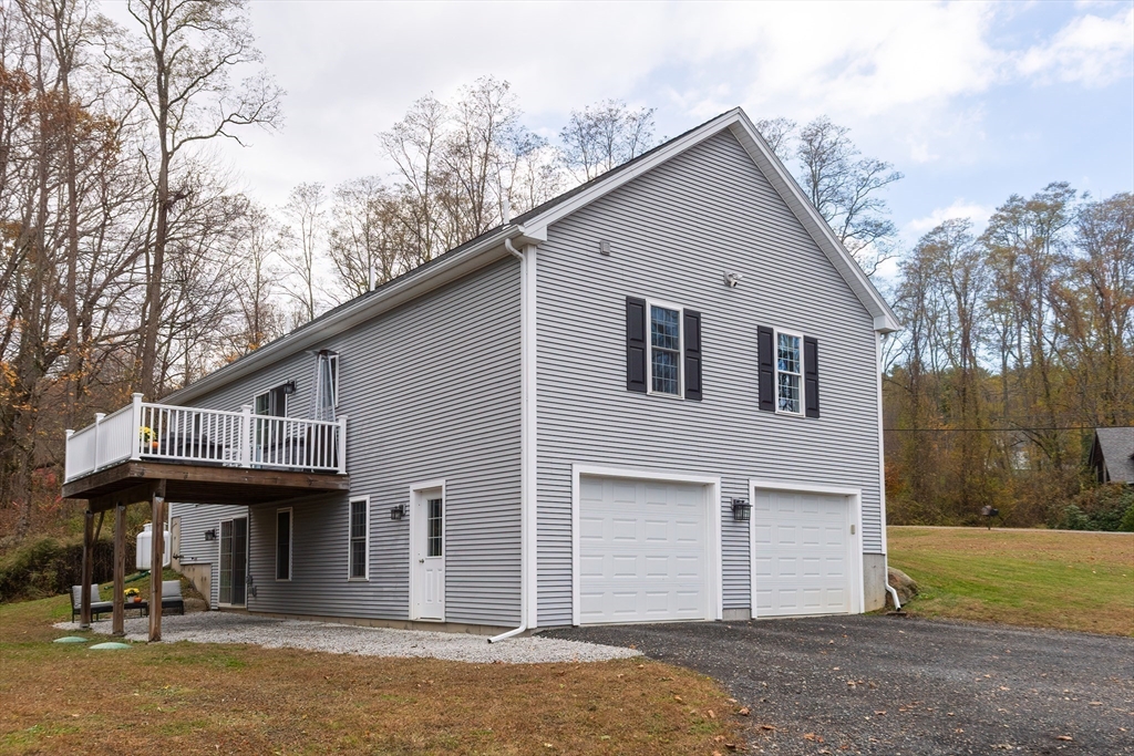 11 Shea Road West Brookfield, MA 01585 - Photo 4 of 42 a front view of a house with a garden