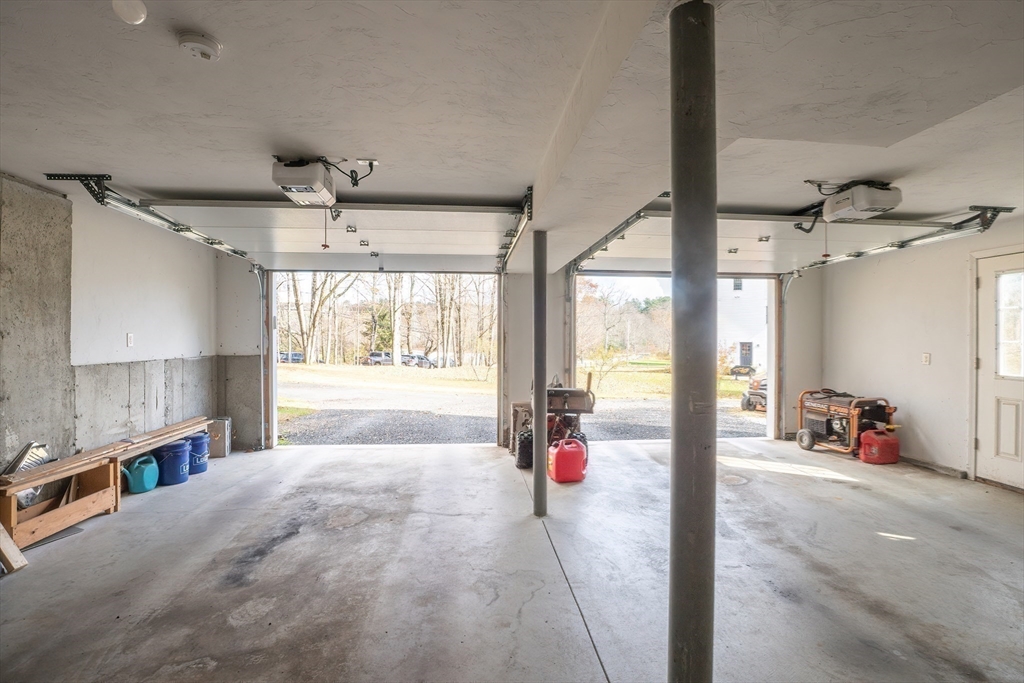 11 Shea Road West Brookfield, MA 01585 - Photo 41 of 42 a spacious bedroom with a bed and a large window