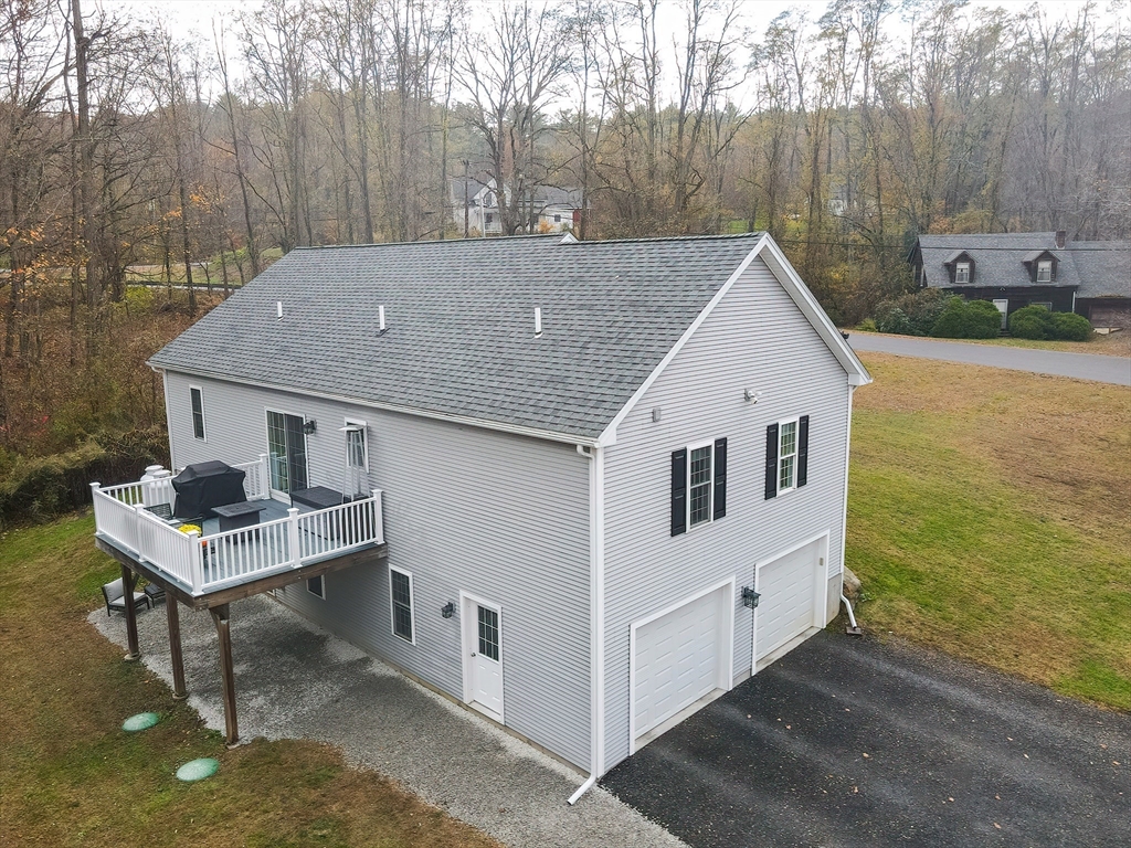 11 Shea Road West Brookfield, MA 01585 - Photo 6 of 42 a view of a house with backyard and trees