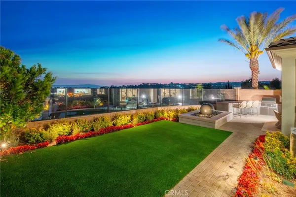 a view of swimming pool with seating area and hardwood floor