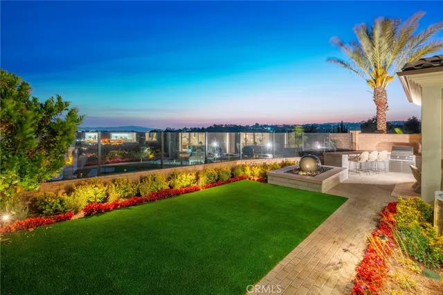 a view of swimming pool with seating area and hardwood floor