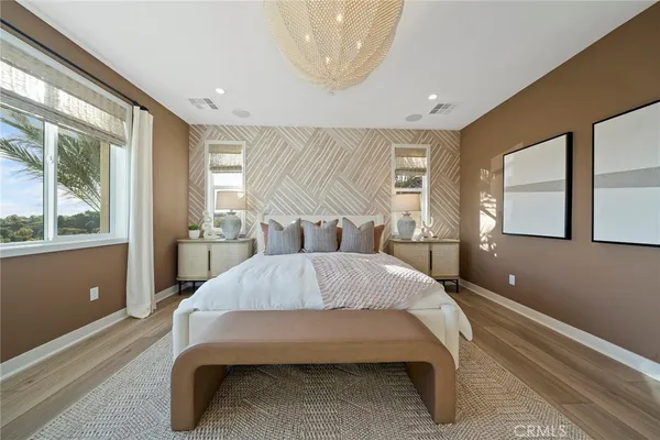 a bed room with a bed and window