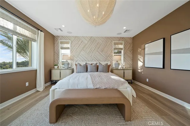 a bed room with a bed and window