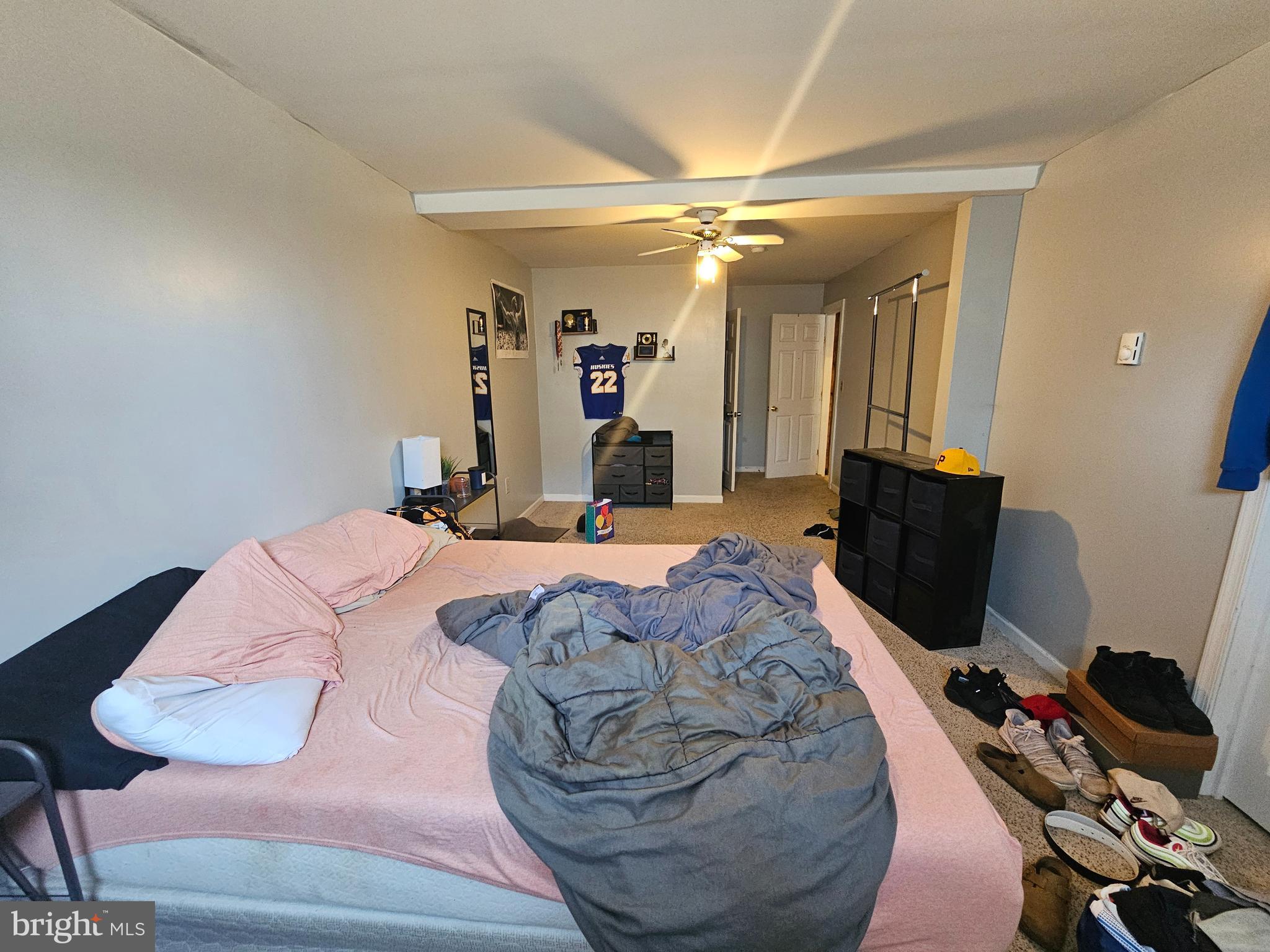4229 Chestnut Ridge Road Grantsville, MD 21536 - Photo 20 of 25 a bed room with a bed a chair and potted plant