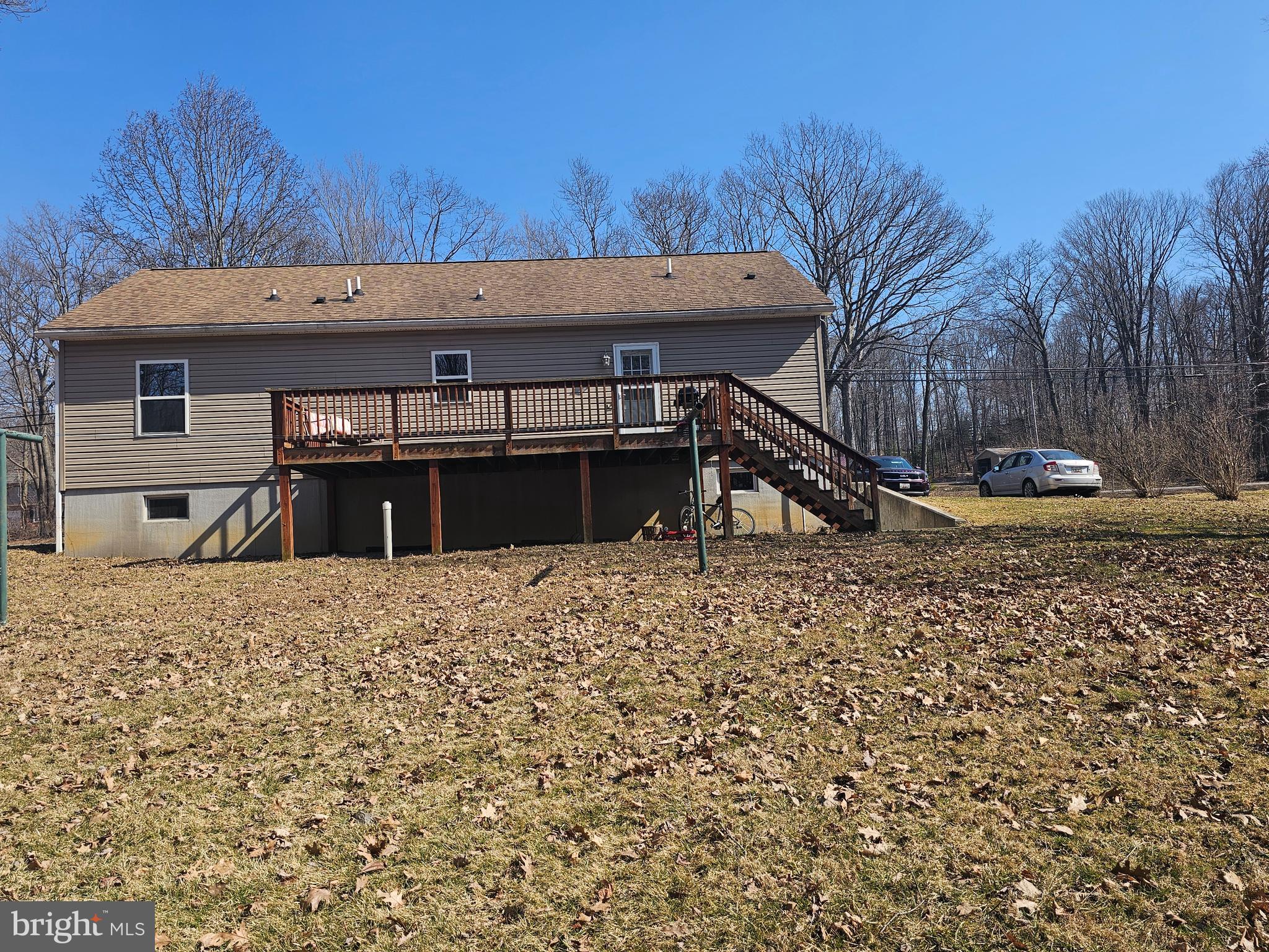 4229 Chestnut Ridge Road Grantsville, MD 21536 - Photo 5 of 25 a front view of a house with a yard