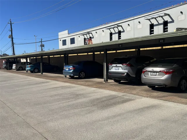 a car parked in front of a building