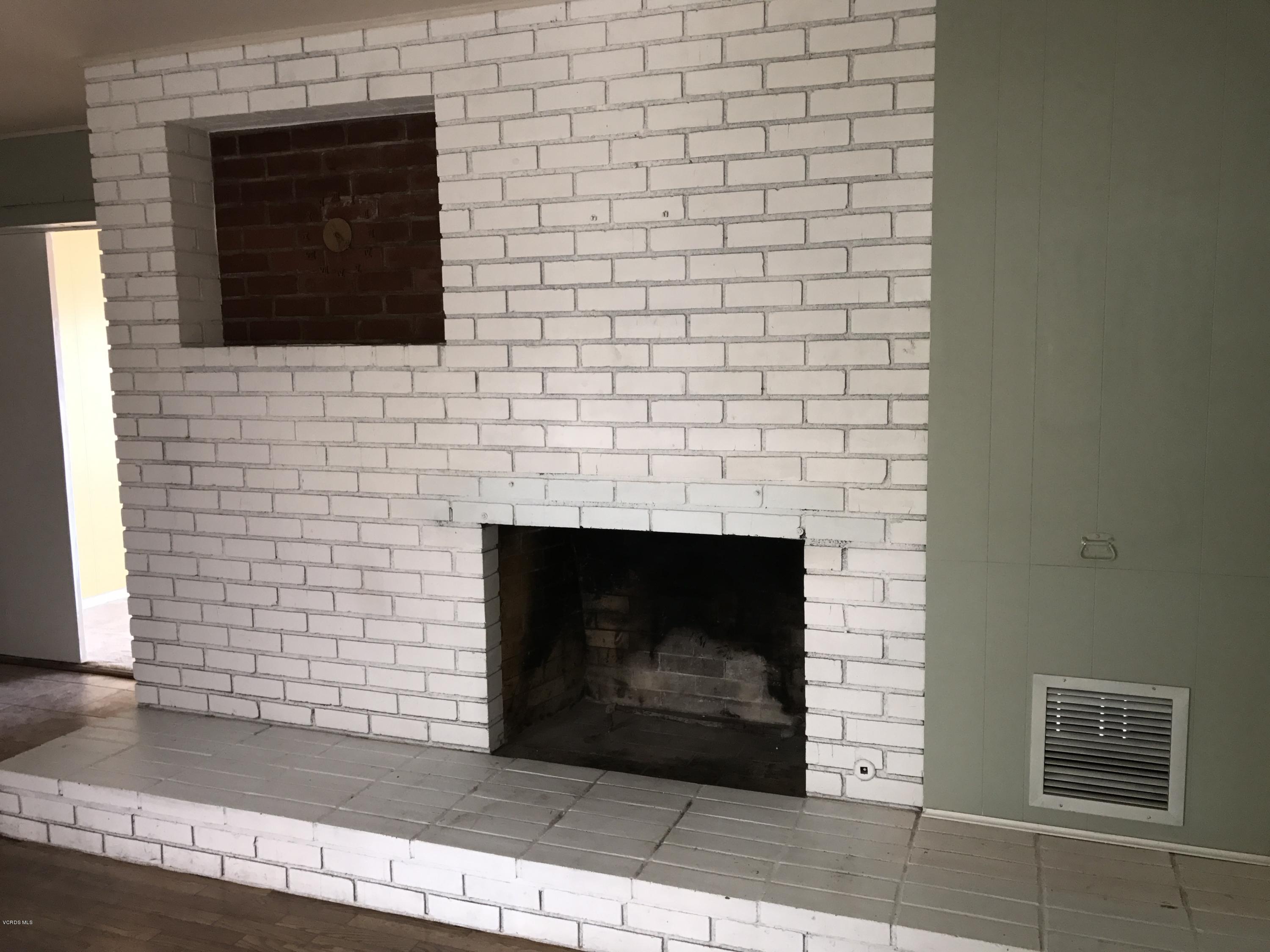 1660 Teal Club Road Oxnard, CA 93030 - Photo 2 of 18 a brick oven with a fireplace