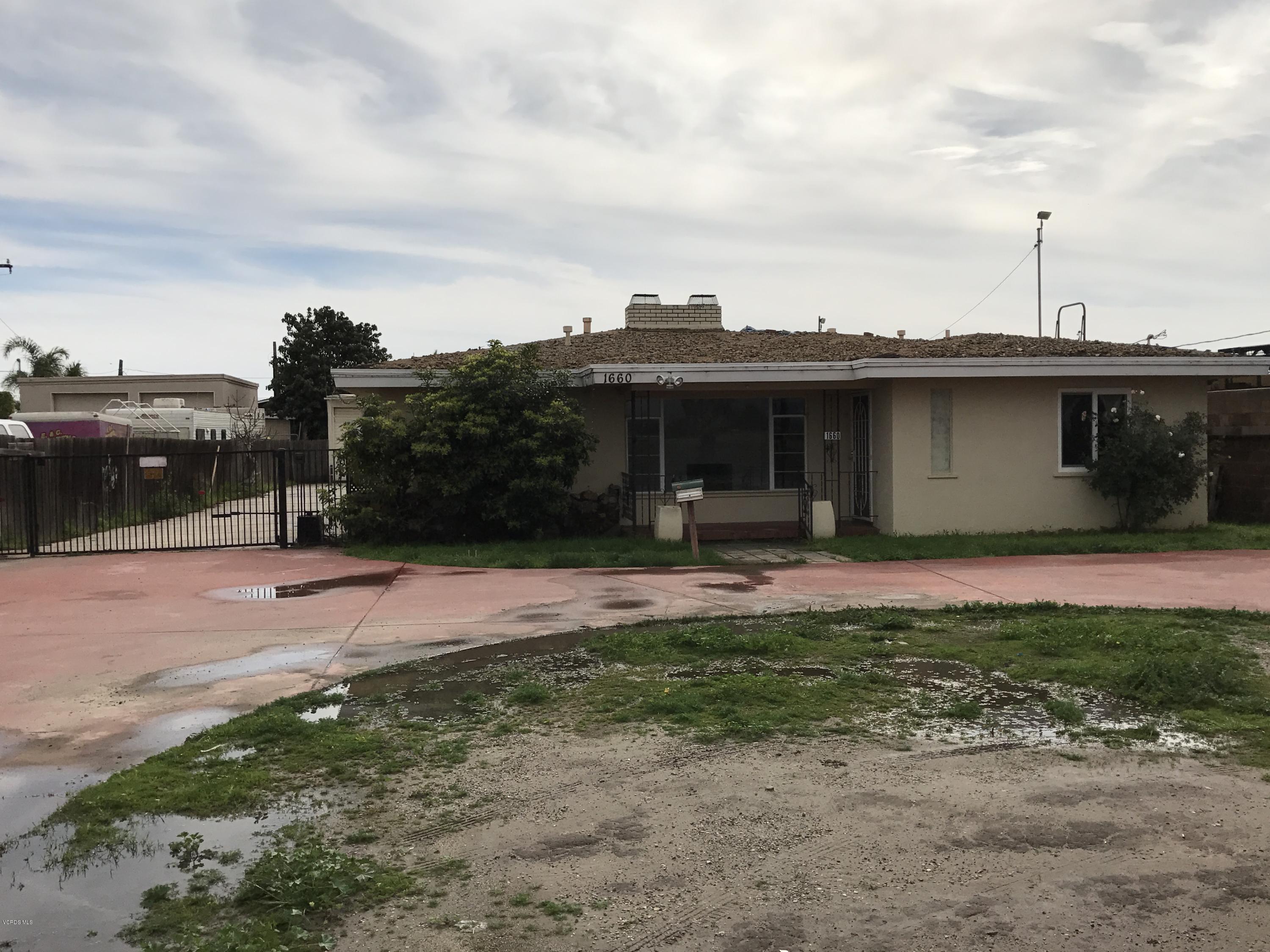 1660 Teal Club Road Oxnard, CA 93030 - Photo 18 of 18 a view of a house with backyard and porch