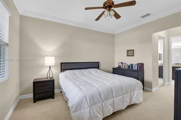 a view of a golf course with a lake view