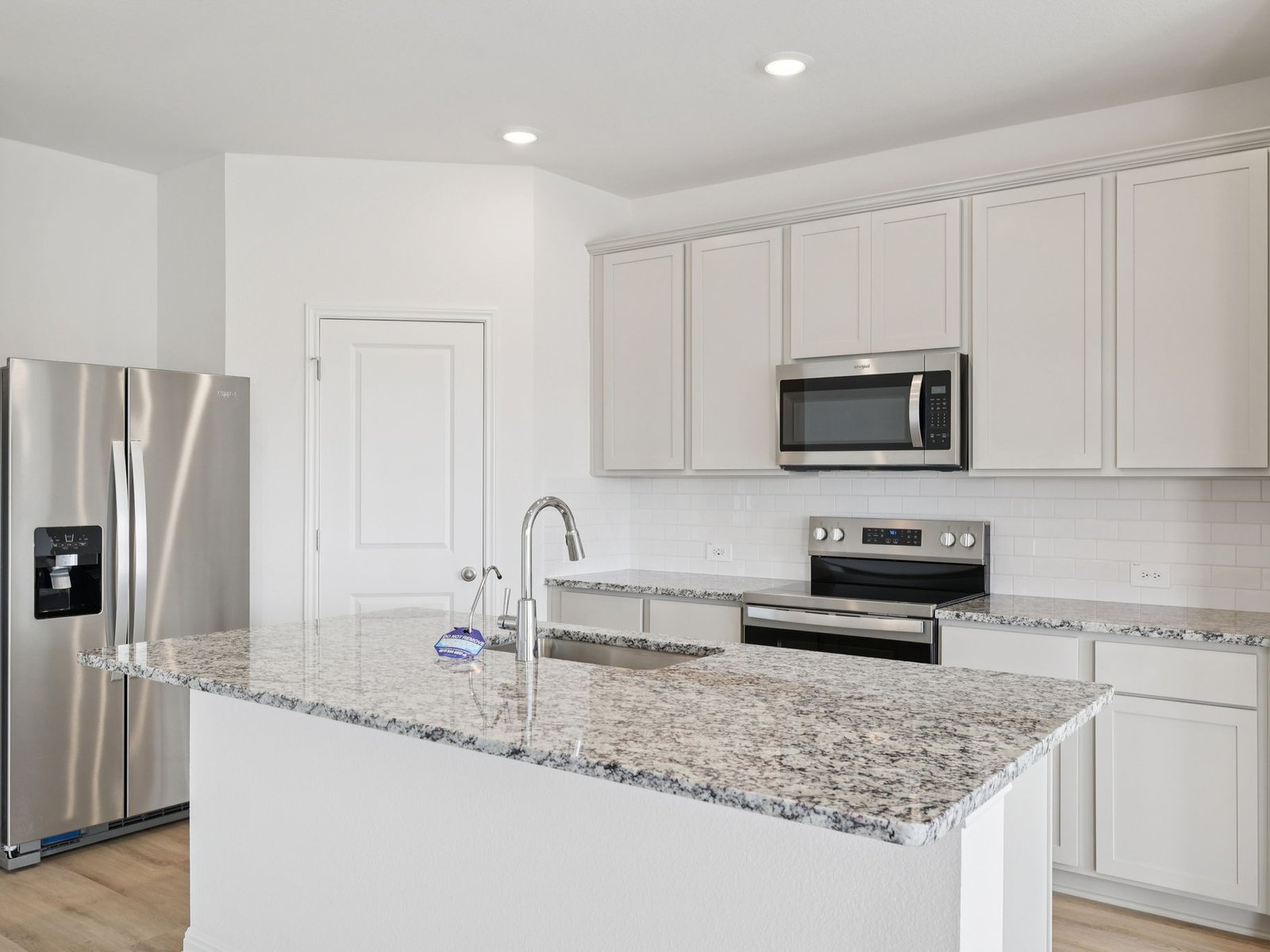 320 Wheel Horse Road Burnet, TX 78611 - Photo 5 of 28 Photo is not of the actual home, but is an inspirational photo of builder’s model home and may depict options, furnishings, and/or decorator features that are not included