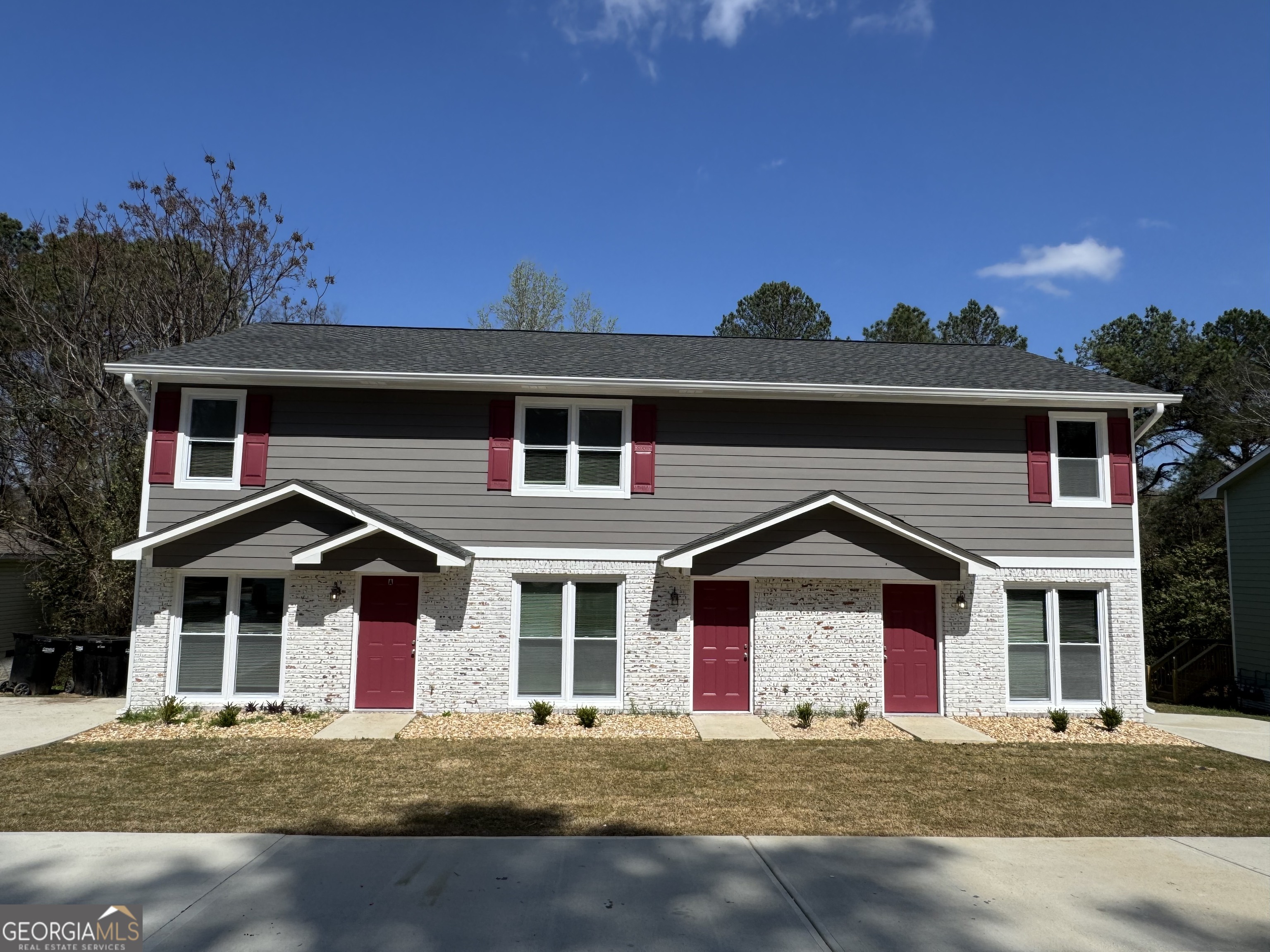 4235 Debby Street Columbus, GA 31907 - Photo 1 of 9 a front view of a house with a yard