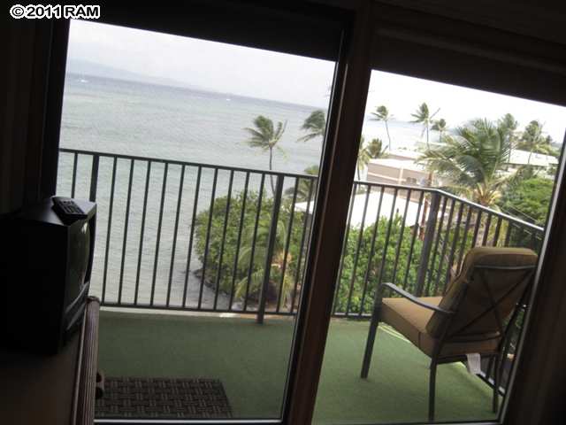 4401 Lower Honoapiilani Road, Unit A604 Lahaina, HI 96761 - Photo 14 of 29 a view of a two chair in the balcony