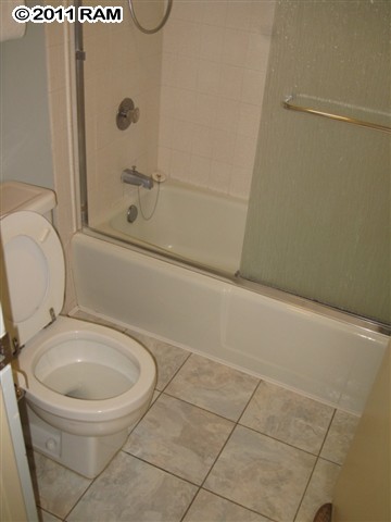 4401 Lower Honoapiilani Road, Unit A604 Lahaina, HI 96761 - Photo 17 of 29 a bathroom with a toilet and a sink
