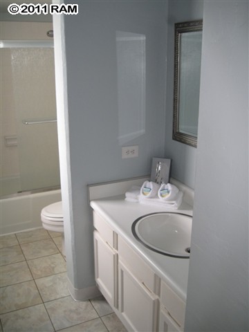 4401 Lower Honoapiilani Road, Unit A604 Lahaina, HI 96761 - Photo 21 of 29 a bathroom with a sink toilet and shower