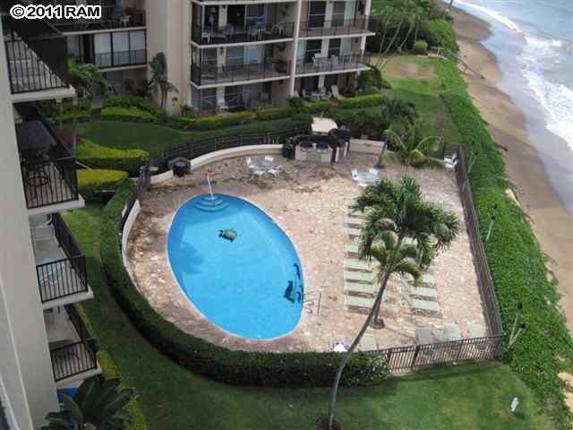 4401 Lower Honoapiilani Road, Unit A604 Lahaina, HI 96761 - Photo 24 of 29 an aerial view of a house with garden space and swimming pool