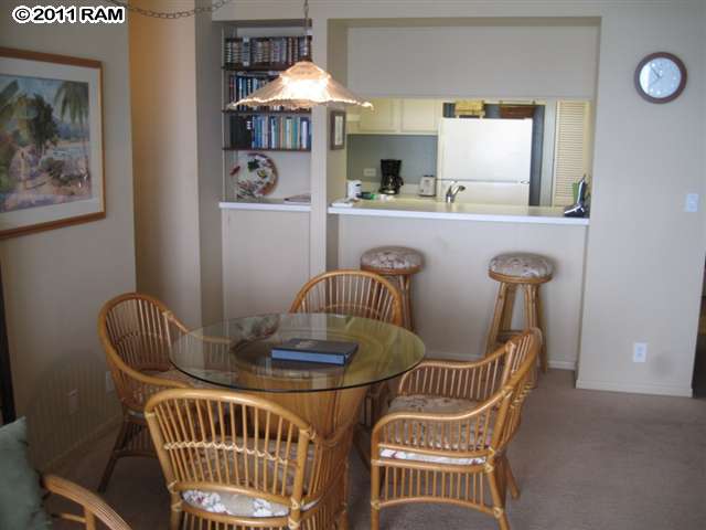 4401 Lower Honoapiilani Road, Unit A604 Lahaina, HI 96761 - Photo 6 of 29 a view of a dining room with furniture