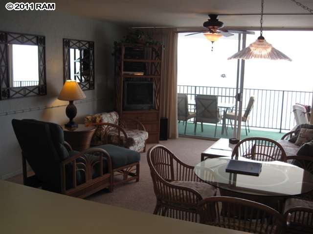 4401 Lower Honoapiilani Road, Unit A604 Lahaina, HI 96761 - Photo 7 of 29 a living room with furniture and a window