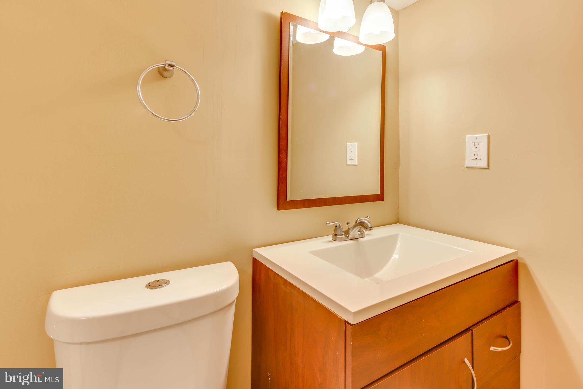 3036 Warehime Road Manchester, MD 21102 - Photo 26 of 30 a bathroom with a sink vanity and toilet