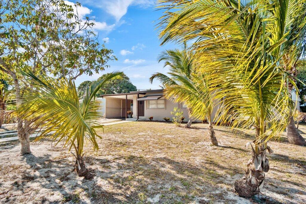 591 Oleander Road Lake Worth, FL 33462 - Photo 3 of 43 Front Exterior R.jpg-SMALL