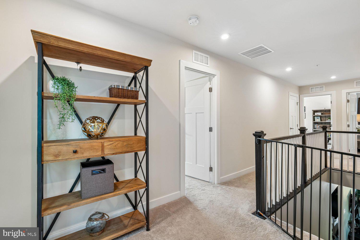 1275 Upper Patuxent Ridge Road Odenton, MD 21113 - Photo 41 of 107 WELL-LIT CARPETED HALLWAY W/ LINEN CLOSET