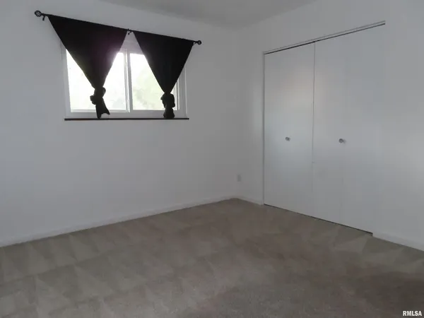 an empty room with window