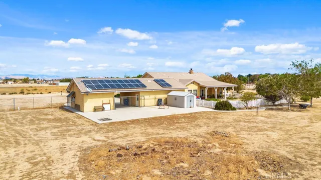 a view of a swimming pool with an ocean view