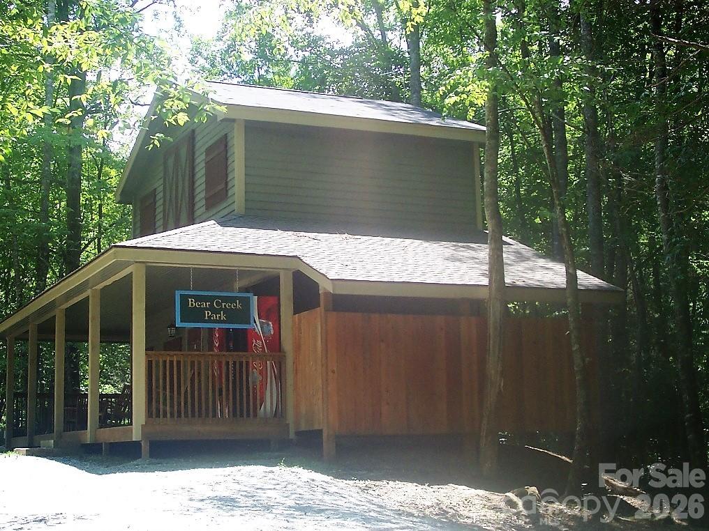 159 Songcatcher Court, Unit 159 Tuckasegee, NC 28783 - Photo 31 of 44 a front view of a house with a yard