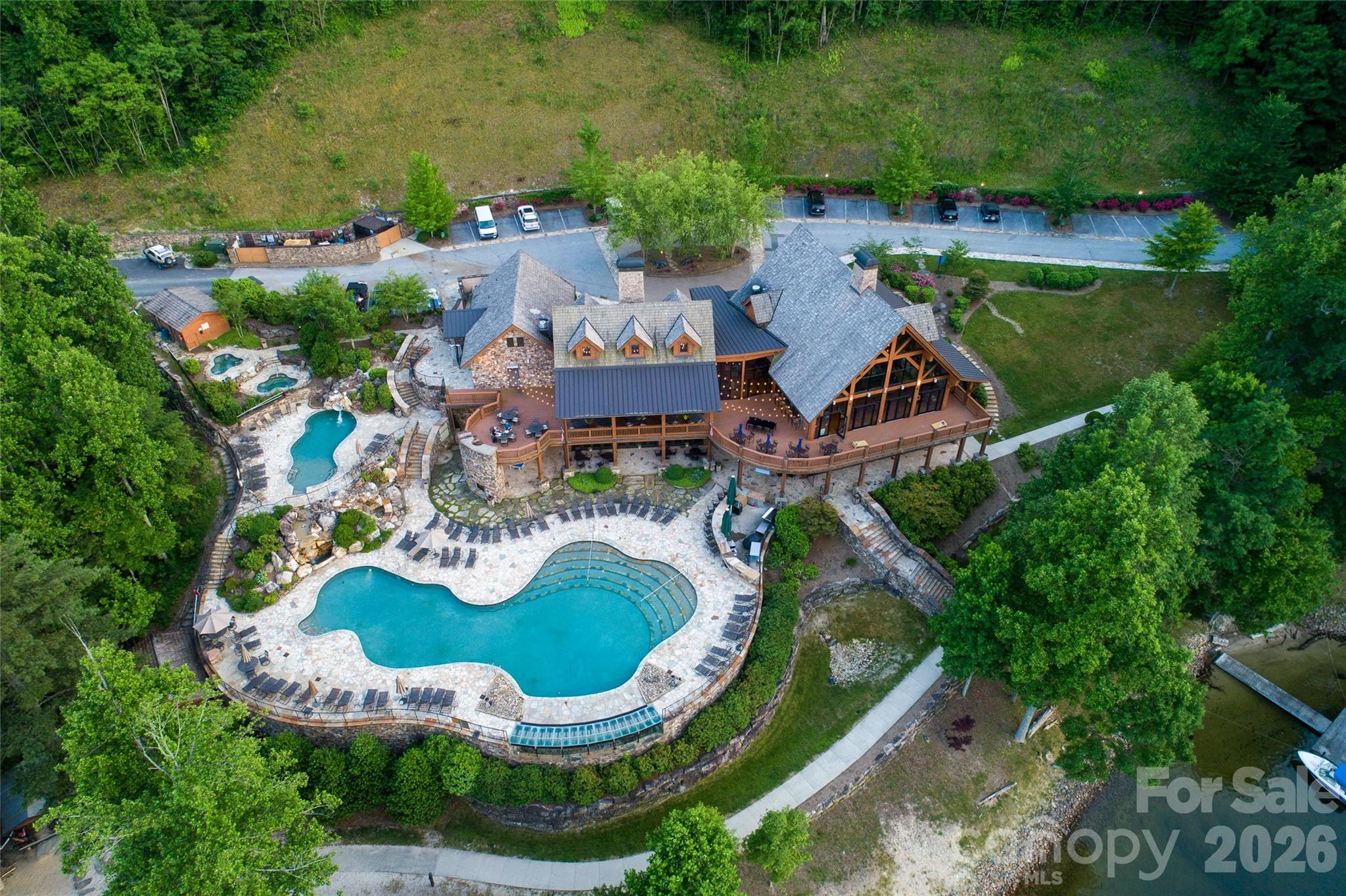 159 Songcatcher Court, Unit 159 Tuckasegee, NC 28783 - Photo 42 of 44 an aerial view of a house