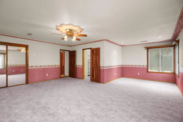 a view of an empty room with window