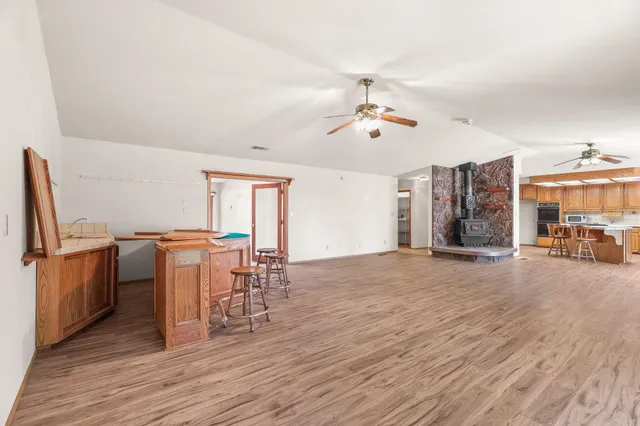 a view of a livingroom with furniture and wooden floor