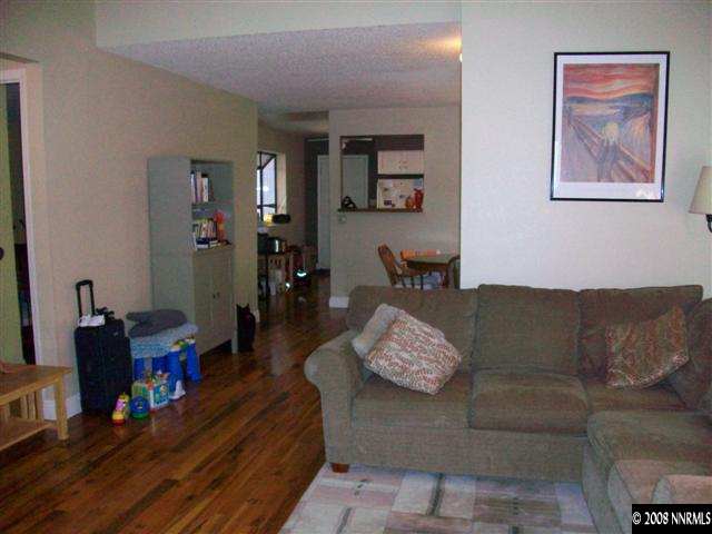 5310 Seville Court Reno, NV 89523 - Photo 7 of 9 a living room with furniture and wooden floor