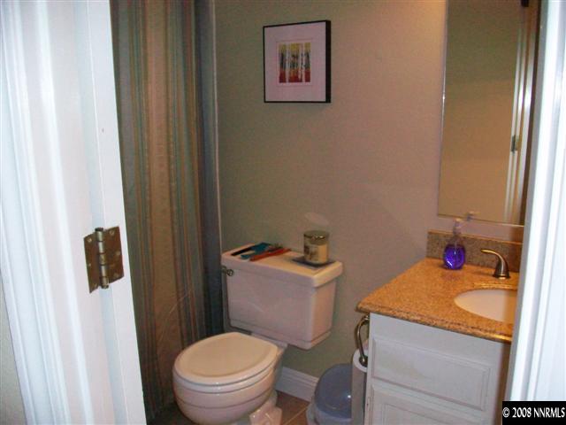 5310 Seville Court Reno, NV 89523 - Photo 9 of 9 a bathroom with a sink and a mirror