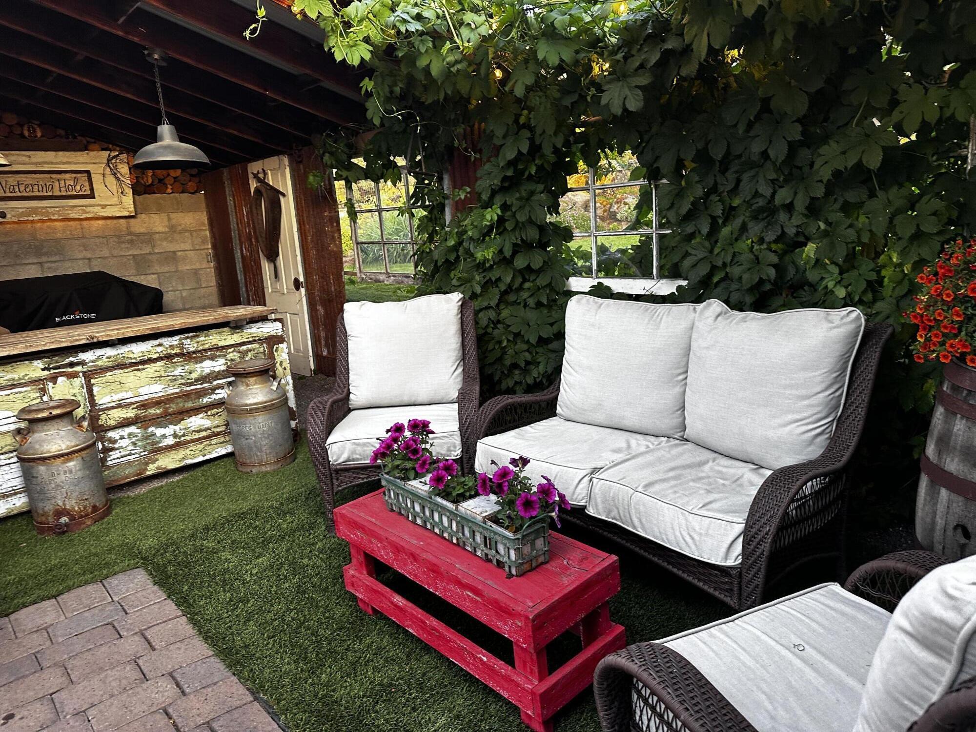 22539 Martee Lane Bend, OR 97701 - Photo 31 of 54 a outdoor living space with furniture and garden view