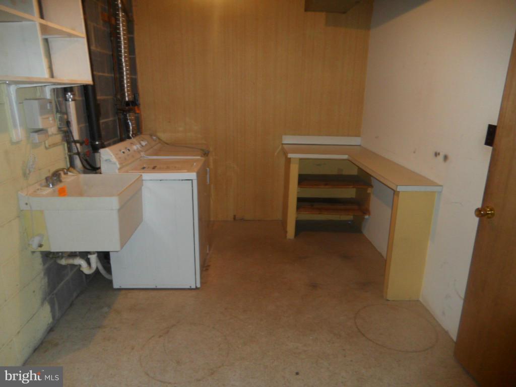 9896 Whiskey Run Laurel, MD 20723 - Photo 12 of 12 a room with storage and utility