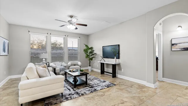 a bedroom with bed and wooden floor