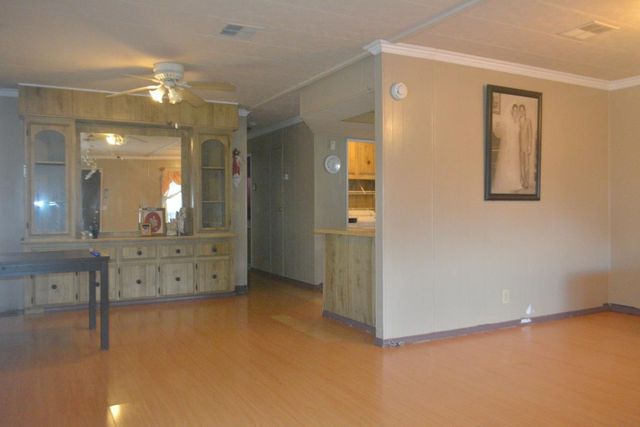 a view of a hallway with front door